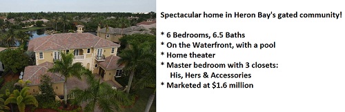 Beautiful waterfront home in gated Heron Bay community